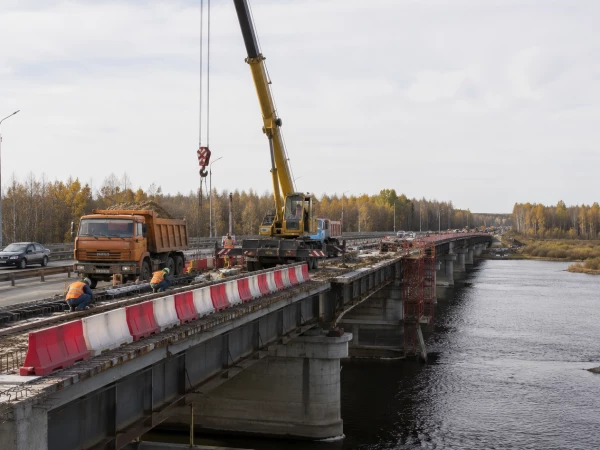 65 тысяч квадратных метров нового асфальта: как в Петербурге ремонтируют мосты